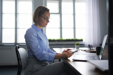 side-view-woman-working-desk